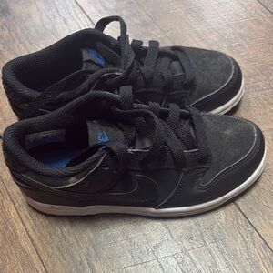 Nike kid’s Black Sneakers with Blue Highlights